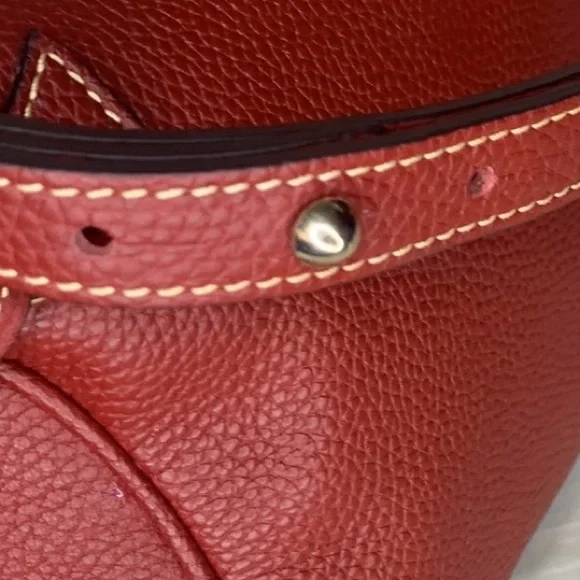 Dooney & Bourke Wine Red Pebbled Tassel Shoulder Bag